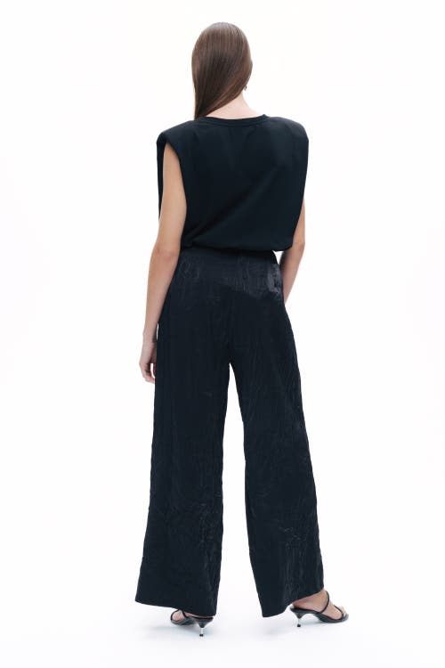 Shop Nocturne Wrinkled Wide-leg Pants In Black