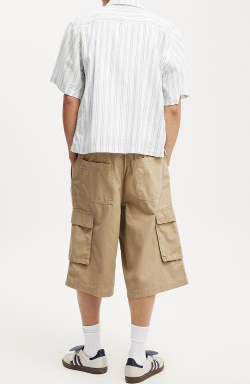 Shop Cotton On Super Baggy Cargo Short In Tan