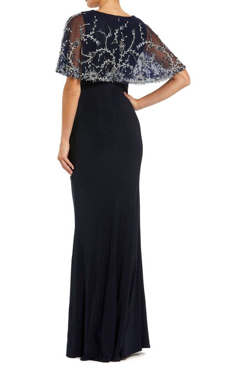 Mac Duggal Fitted Jersey Embellished Cape Gown In Black