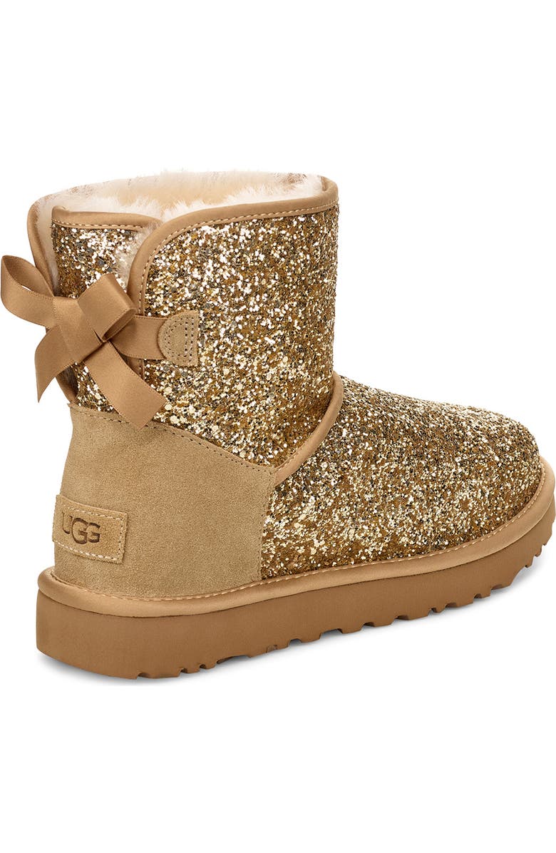 UGG<sup>®</sup> Classic Cosmos Bow Mini Bootie, Alternate, color, Gold