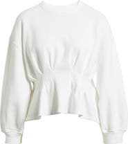 THE GREAT. The Slouchy Cotton Corset Peplum Sweatshirt