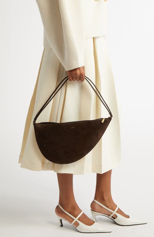 Totême Toteme Scooped Suede Sling Bag In Pepper