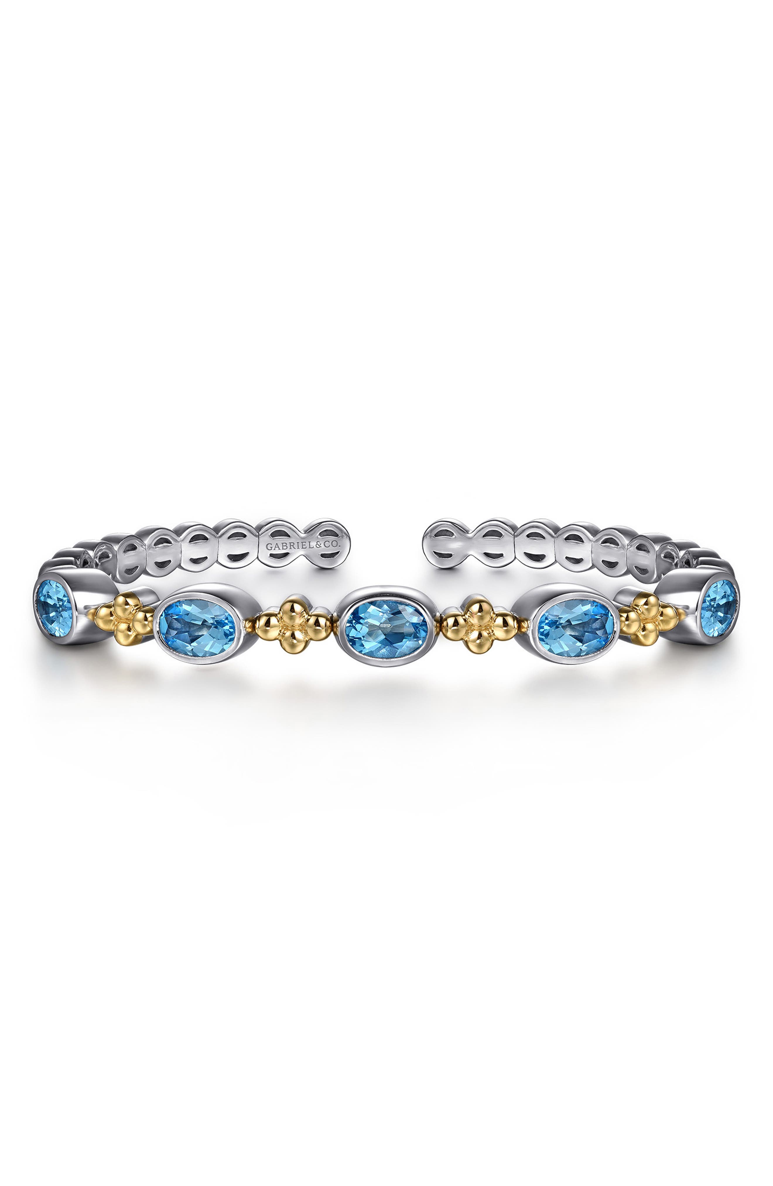 selected STERLING / 14K/ BLUE TOPAZ
