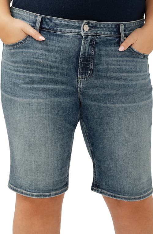 Shop Silver Jeans Co. Elyse Curvy Mid Rise Denim Bermuda Shorts In Indigo