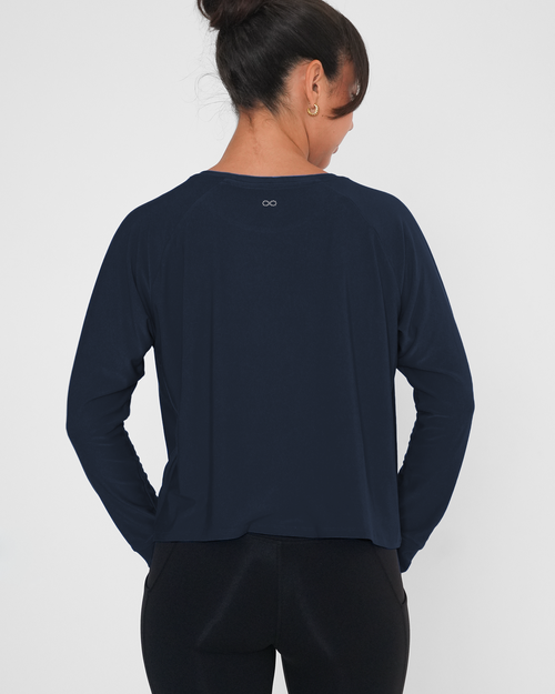 Rebody Active Sera Mid Length Boxy Nylon Long Sleeve Top In Blue