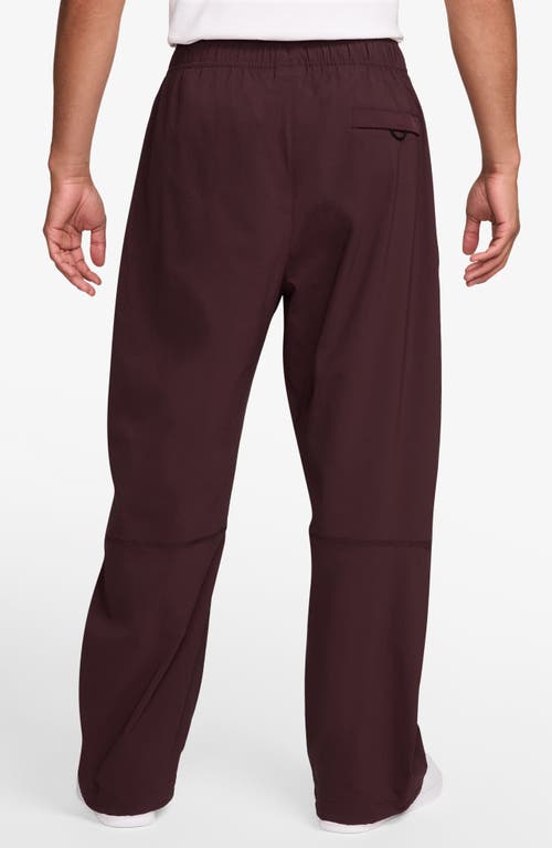 Nike Dri-fit Tech Wide Leg Woven Pants In Burgundy