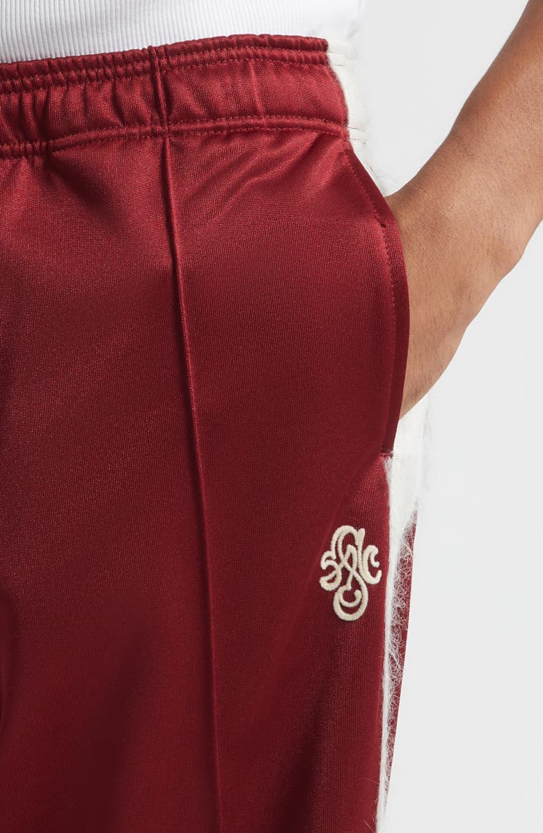STOCKHOLM SURFBOARD CLUB Monogram Track Pants, Alternate, color, Cherry