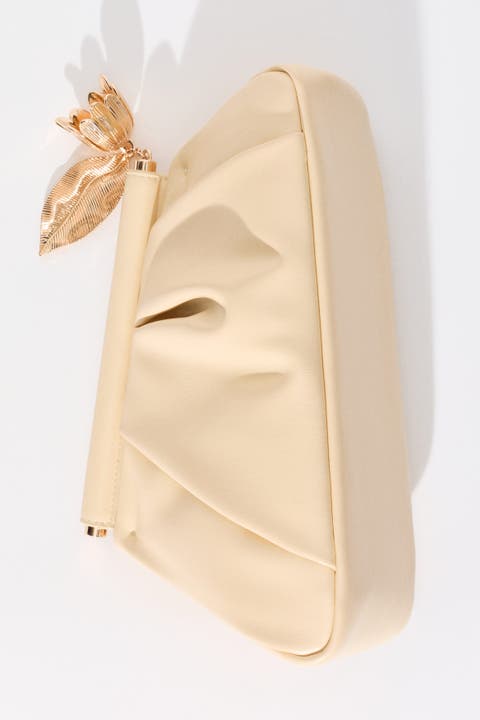 Asymmetric clutch bag