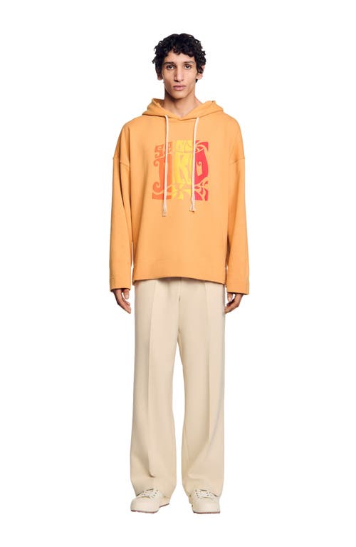 Sandro Graphic Oversized Pullover Hoodie In Mandarin.