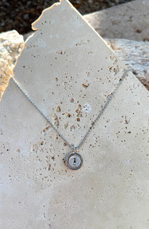 Adornia Silver Plated Cz Dancing Stone Disc Pendant Necklace In Metallic