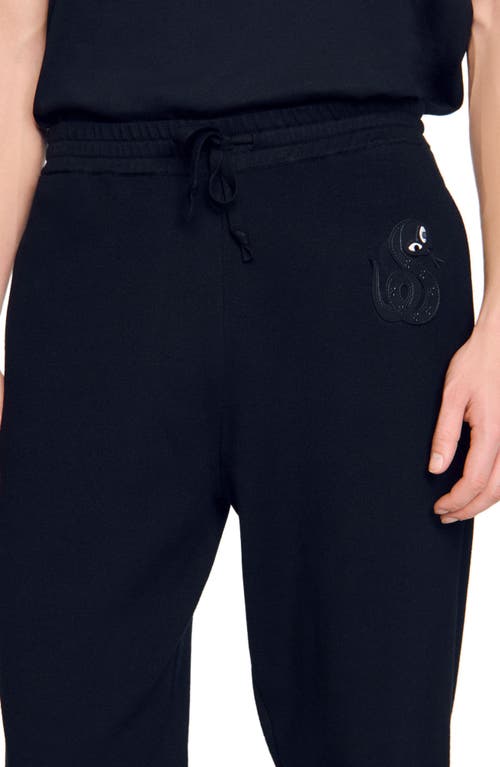 Sandro Jogging Bottoms With Snake Detail In Black