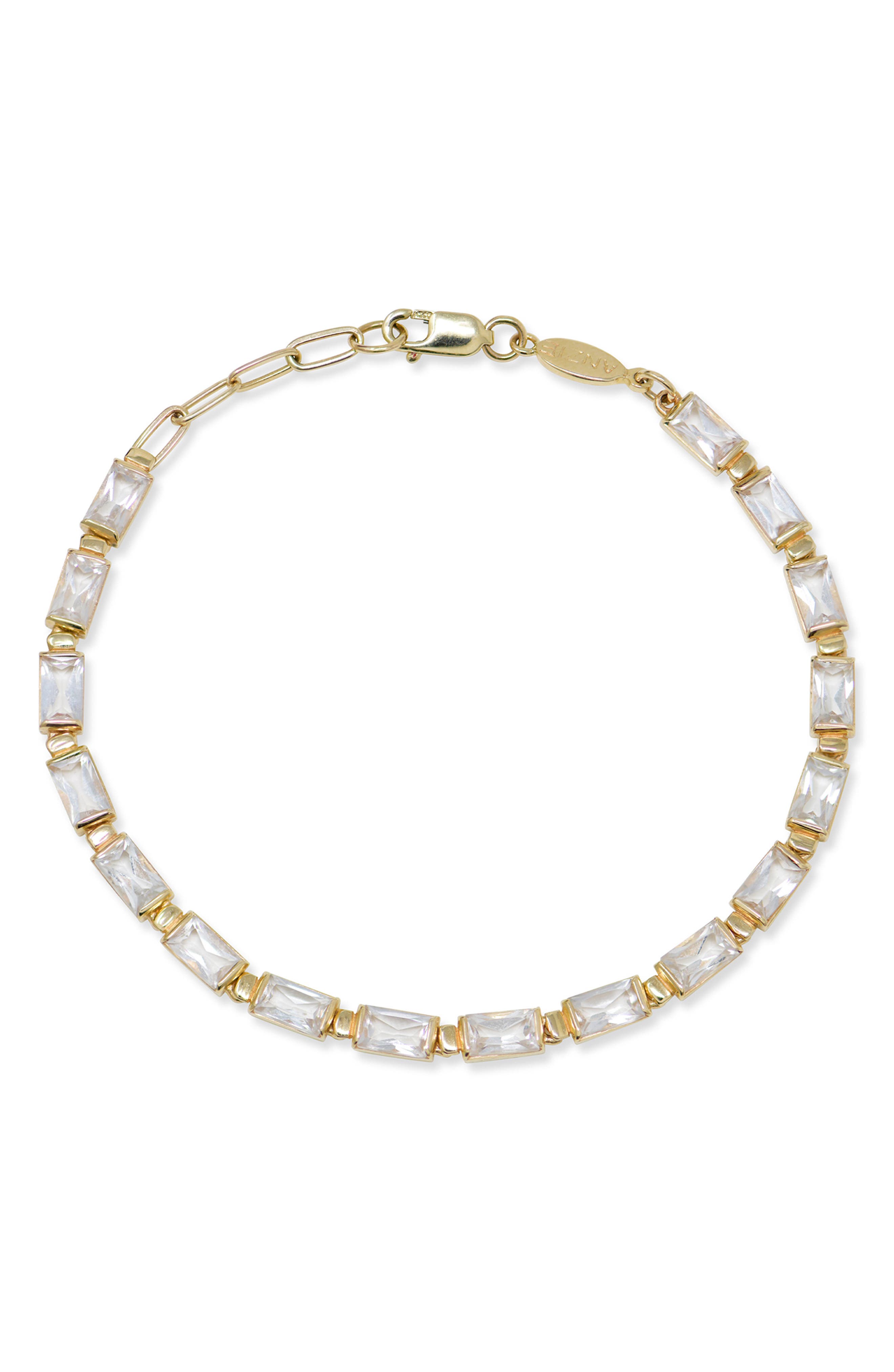 selected 14K YELLOW GOLD/ CLEAR TOPAZ
