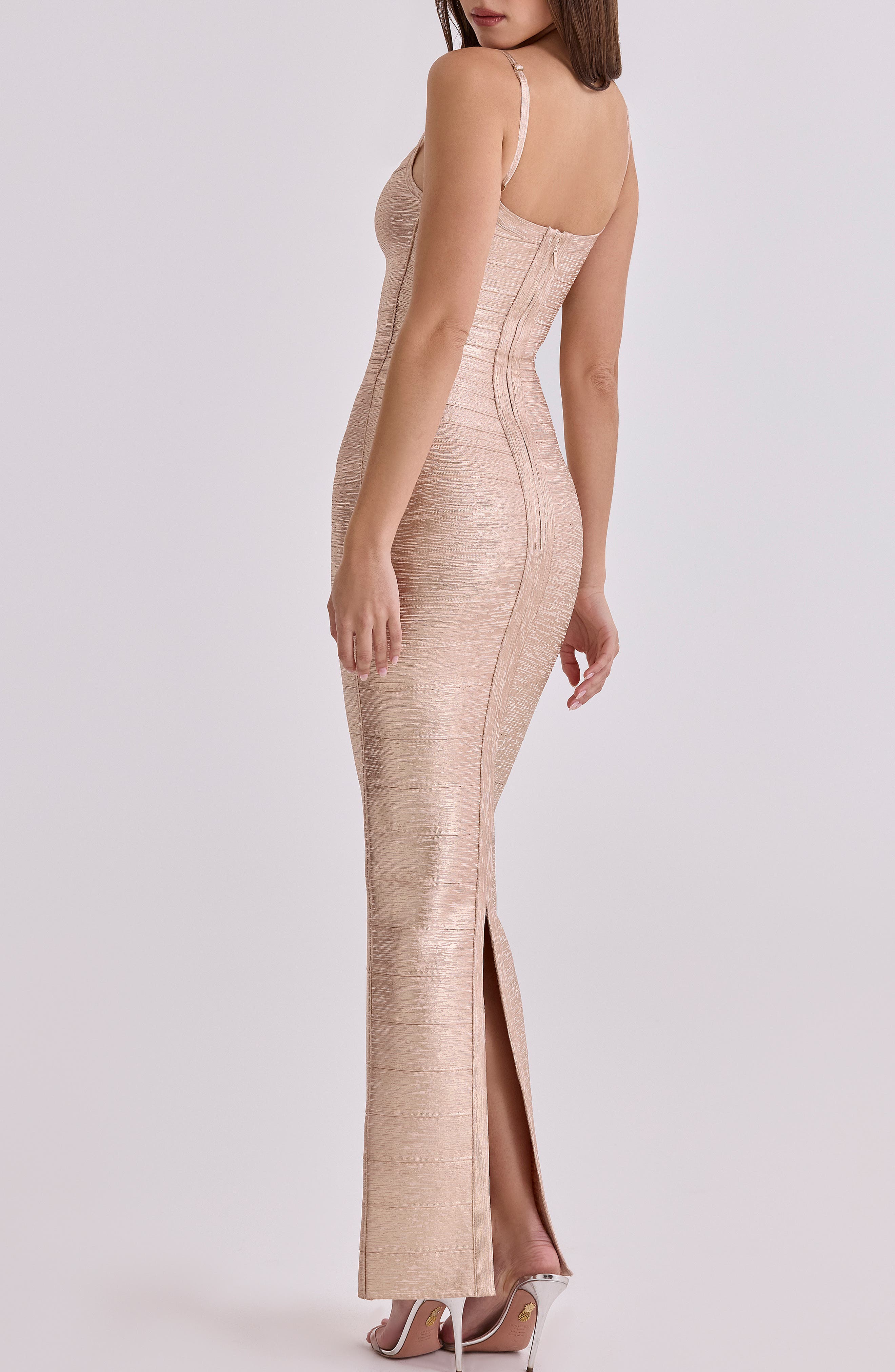 bandage maxi dress Burgundy Strapless Simply style with high heels and a sleek updo to let the glamorous metallic look and flowy hem shine Fariah Burgundy Bandage Maxi Dress