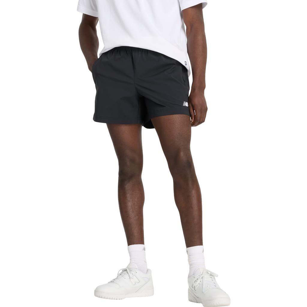 NEW BALANCE NEW BALANCE ATHLETICS WOVEN STRETCH NYLON SHORTS