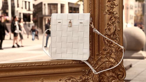 Madison Maison Woven Leather Lock Crossbody Bag In White