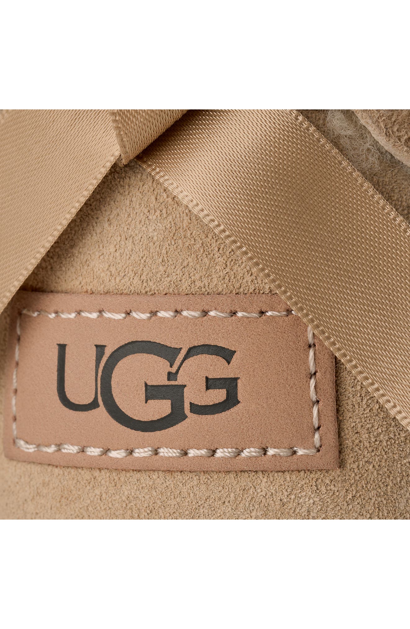 Ultra Mini Bailey Bow Genuine Shearling Boot, Alternate, color, SAND