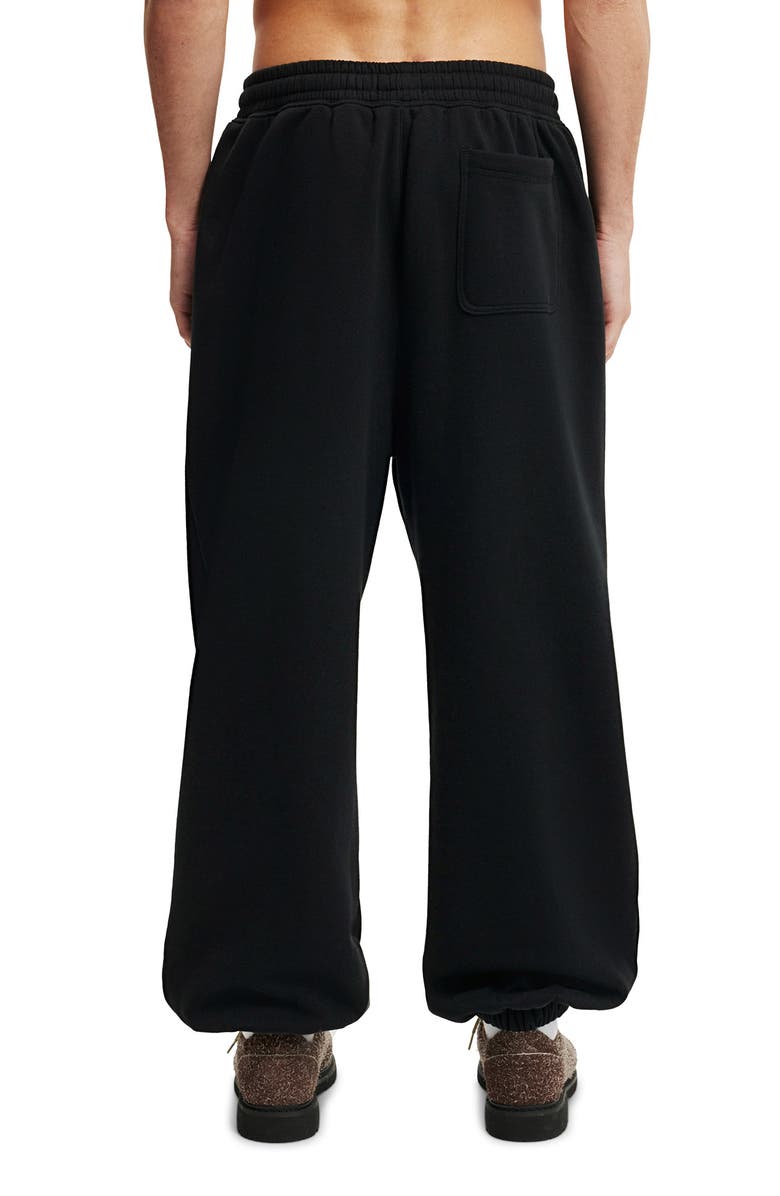 Cotton On Men's Super Baggy Cuffed Track Pant, Alternate, color, Black