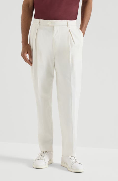 Trousers with tee holder