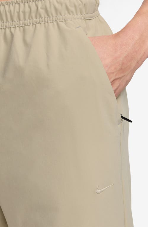 Nike Dri-fit Unlimited Drawstring Pants In Brown
