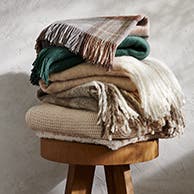 A stack of folded blankets.