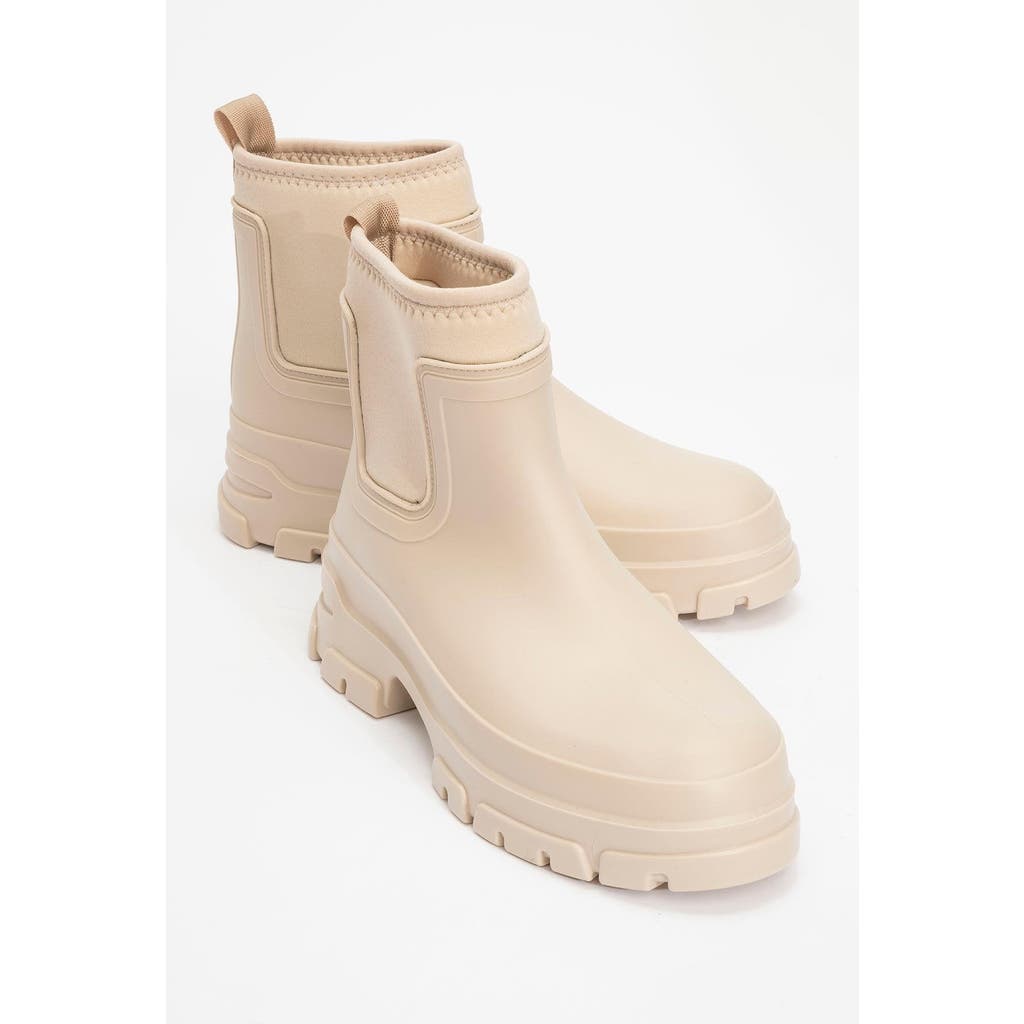 Prologue Shoes Ploye Rain Boot In Neutral