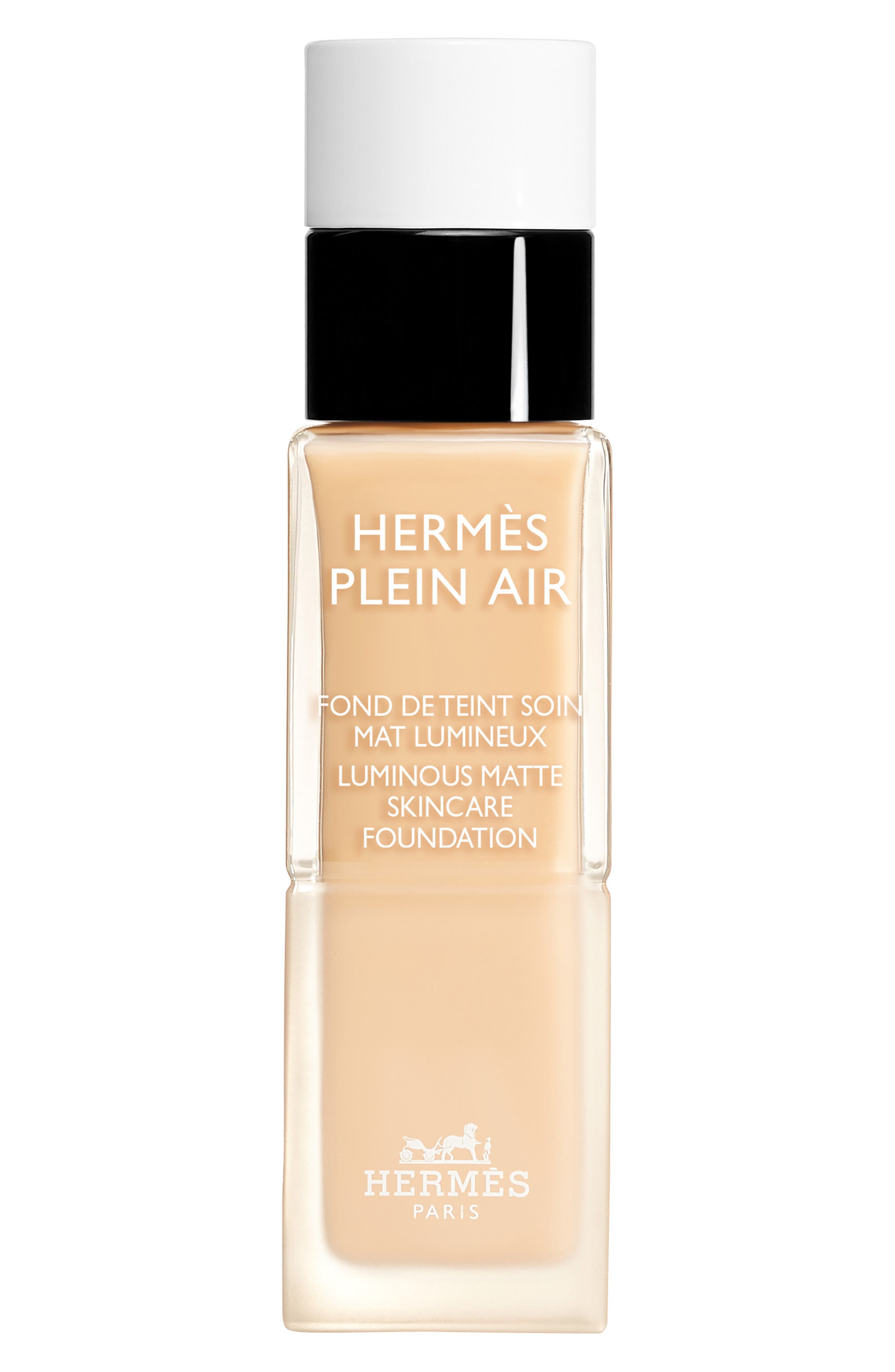 Hermès Plein Air Luminous Matte Skincare Foundation bottle on white background — Hermès