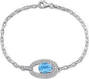 DELMAR Sky Blue Topaz and Lab Created Sapphire Halo Bracelet