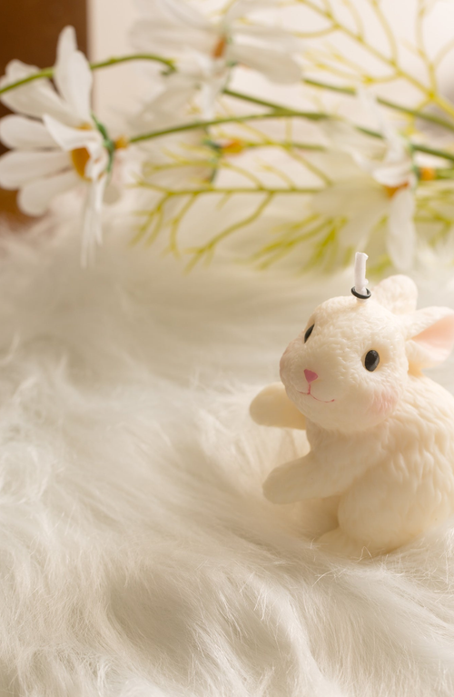 Southlake Gifts Blushing Bunny Candle In Looking Left