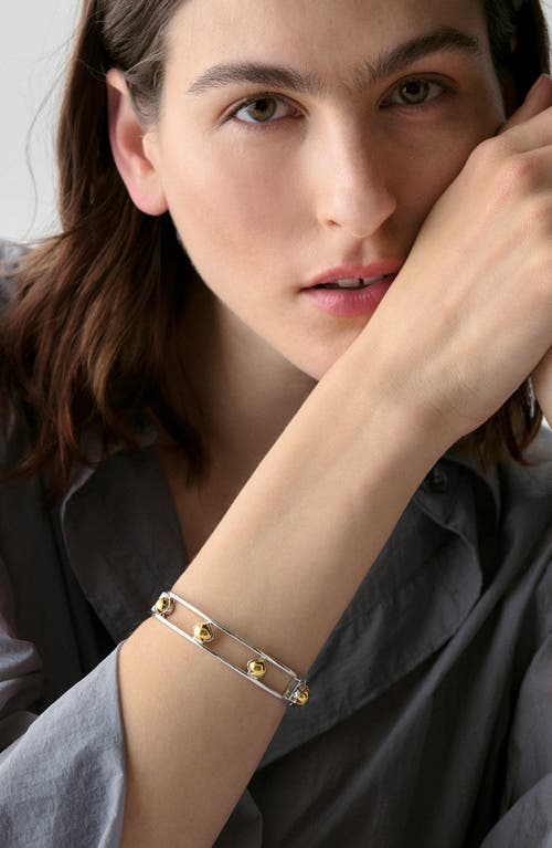 Kate Spade Two-tone Sculpted Spade Cut Out Bangle Bracelet In Metallic