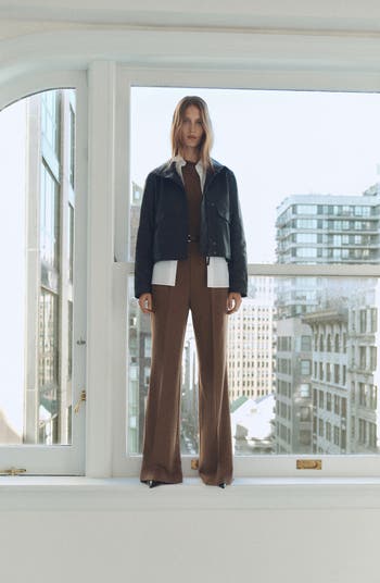 Belted Long Sleeve One-Shoulder Jumpsuit