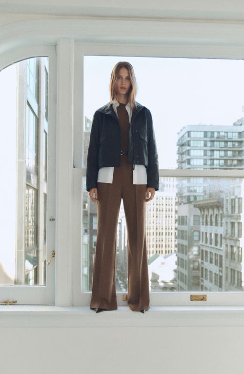 Shop Mango Belted Long Sleeve One-shoulder Jumpsuit In Brown