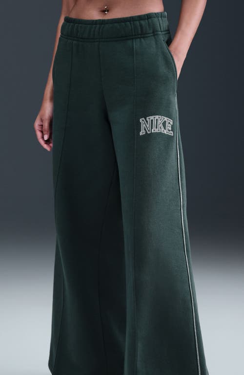 Nike Sportswear Phoenix High Waist Flare Leg Sweatpants In Green