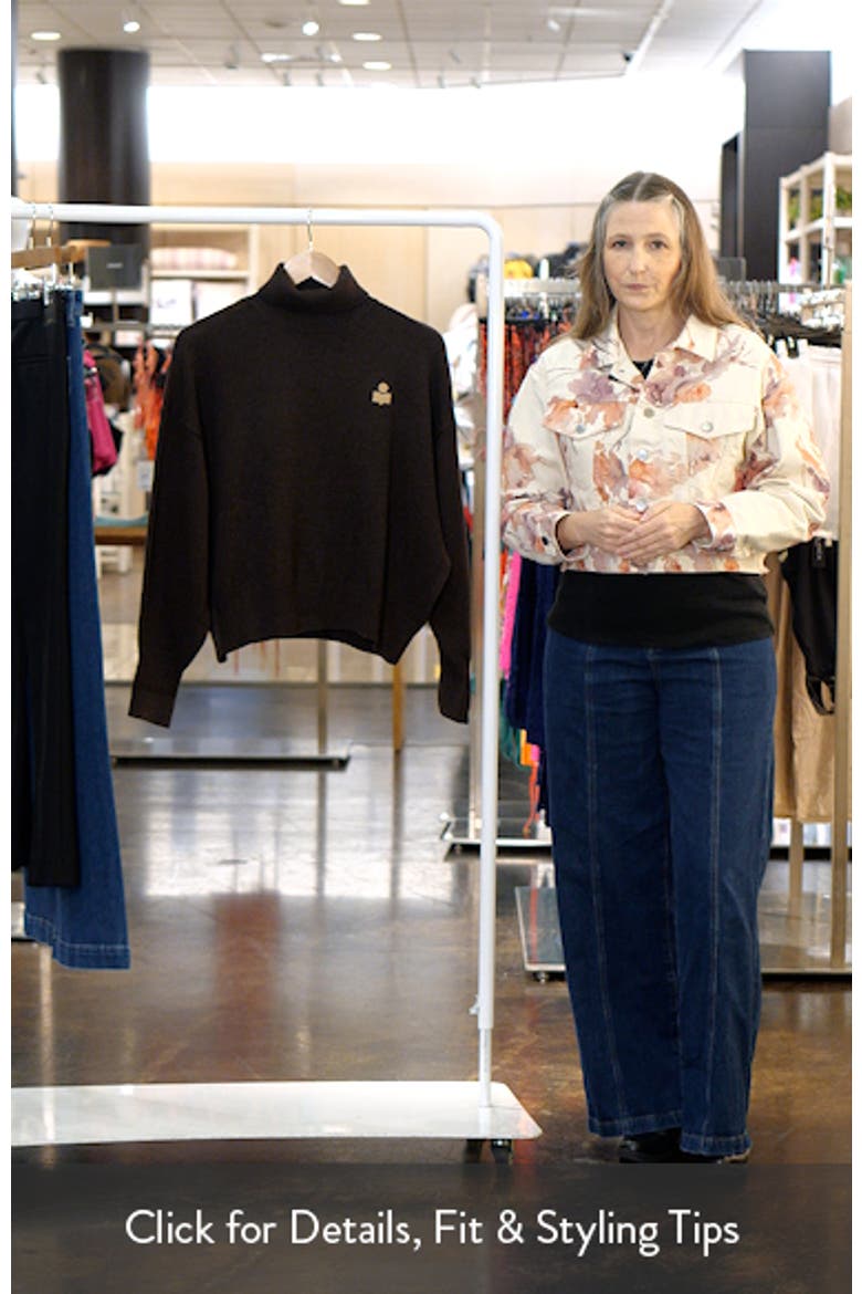 Nasha Logo Turtleneck Sweater video