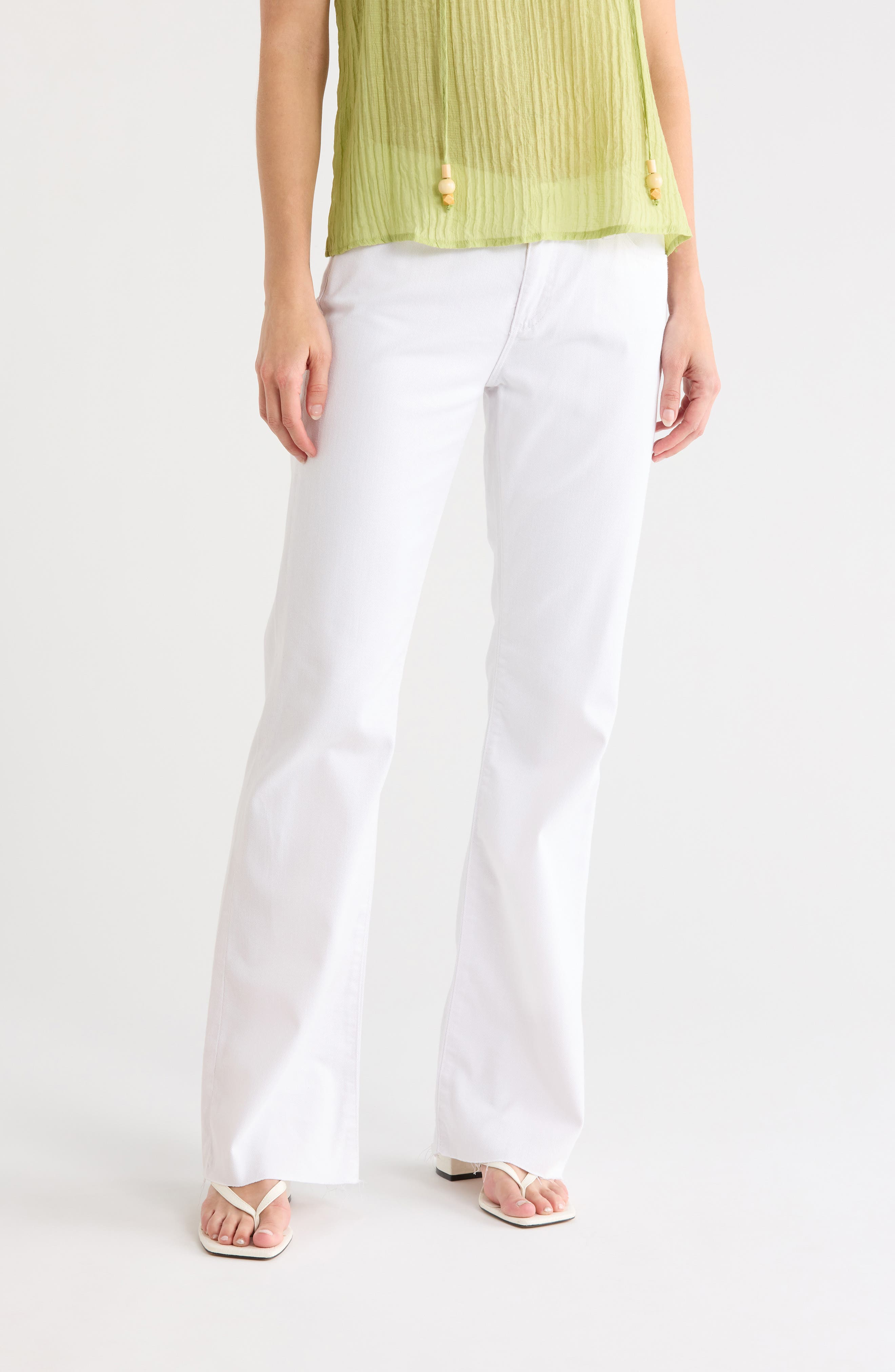 AG Angel Raw Hem Low Rise Bootcut Jeans