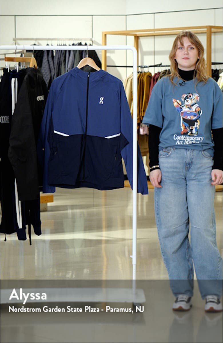 Core Hooded Packable Running Jacket, sales video thumbnail