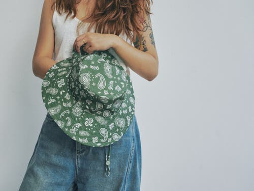 Lost Pattern Nyc "paisley" Cotton Reversible Sun Hat In Green