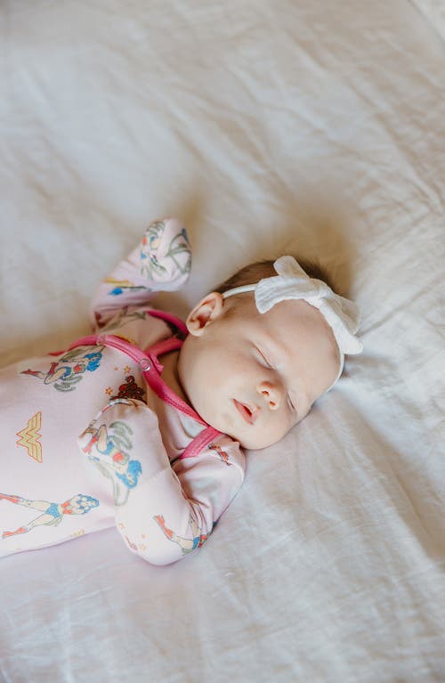 Copper Pearl Wonder Woman Newborn Knotted Gown In Wonder Woman