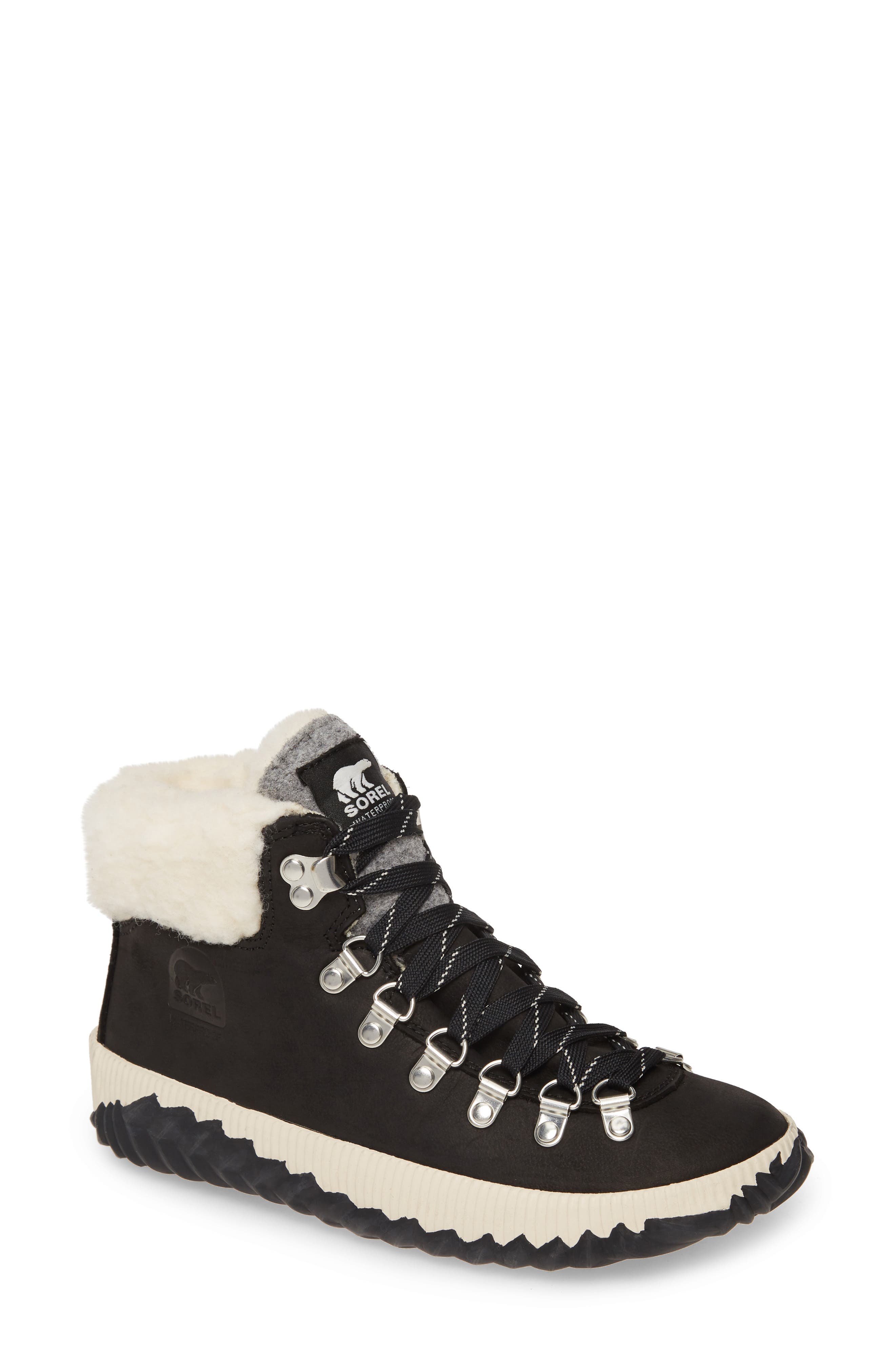 SOREL Out 'N About<sup>™</sup> Conquest Waterproof Bootie with Faux Fur Trim, Main, color, 