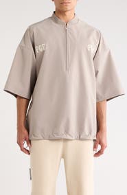 Fear of God Essentials Half Zip Drawstring Hem Baseball Jacket