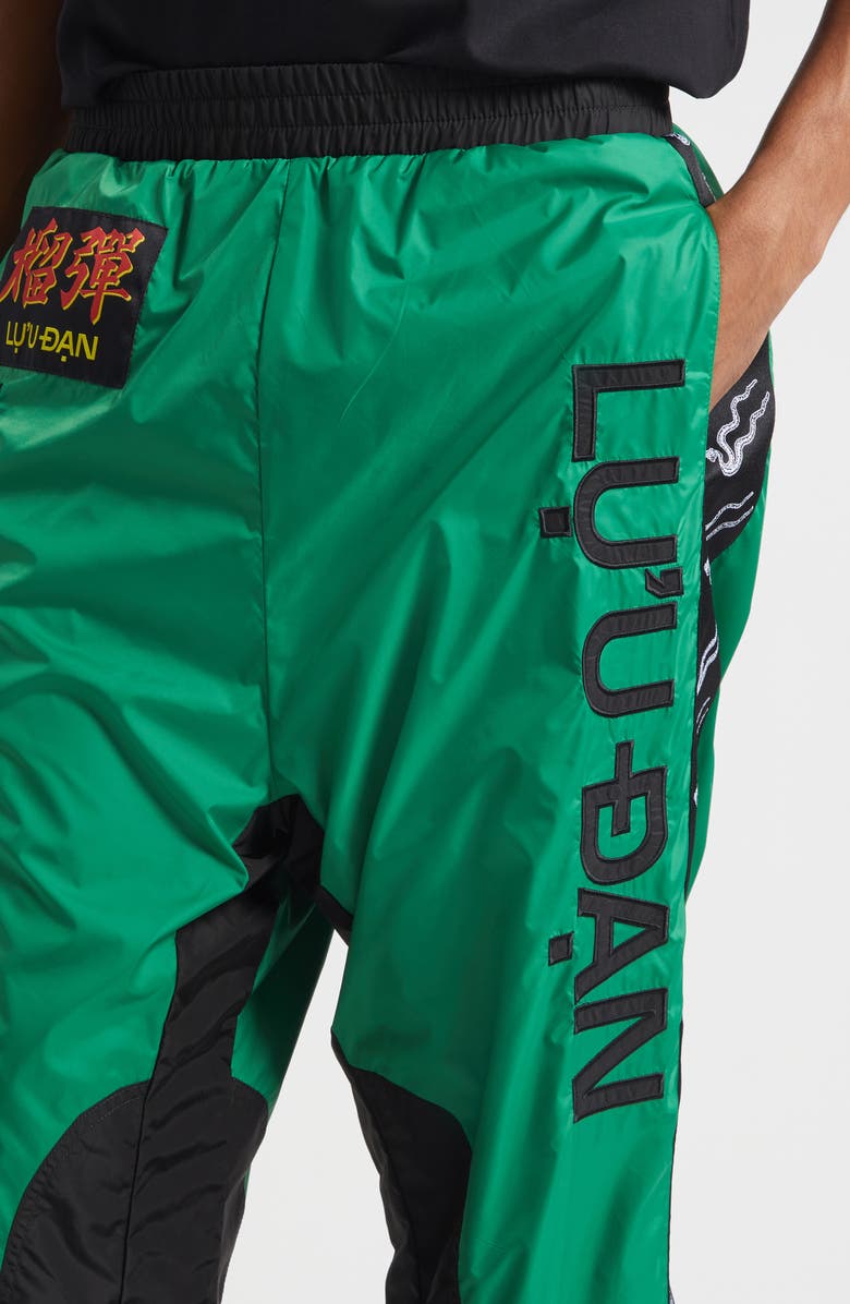 LU
U DAN Nylon Track Pants, Alternate, color, Racing Green / Black
