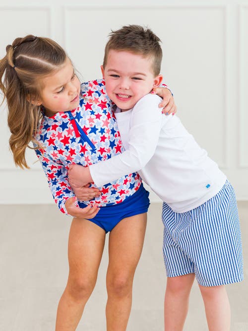 Shop Ruggedbutts Boys Upf50+ Swim Trunks