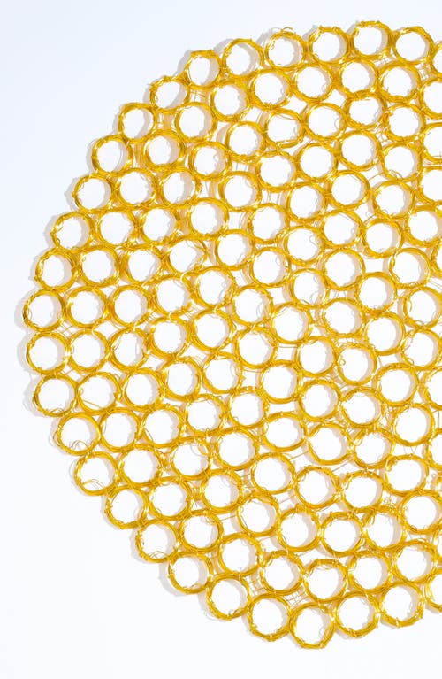 Tiramisu Honeycomb Gleam Metal Placemat In Gold