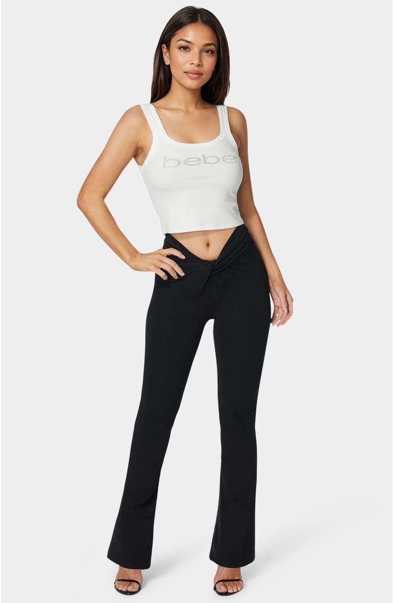 bebe Twisted Waist Flared Leg Pant, Main, color, Black