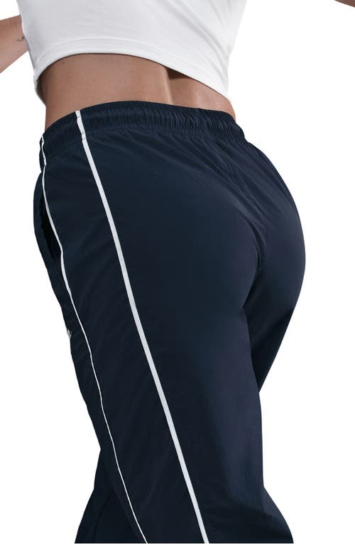 Nike Sportswear Windrunner Water Repellent Track Pants In Blue