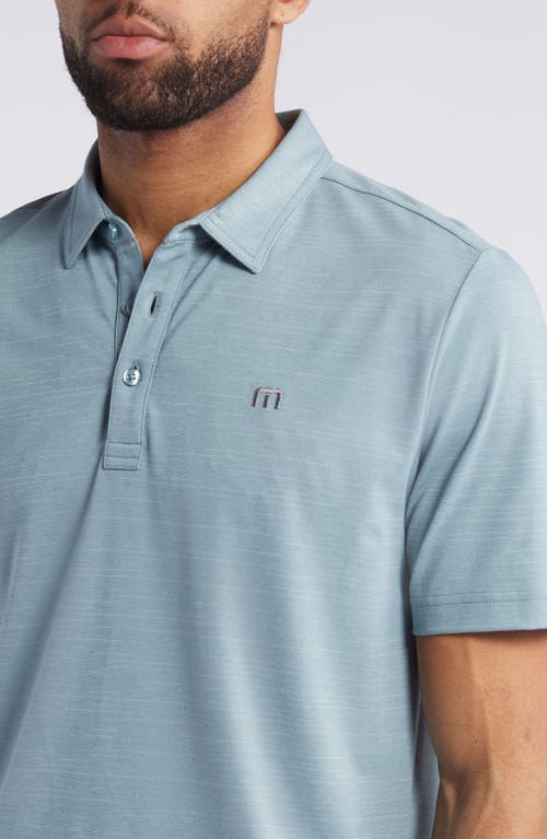 Travismathew The Heater Solid Short Sleeve Performance Polo In Arona