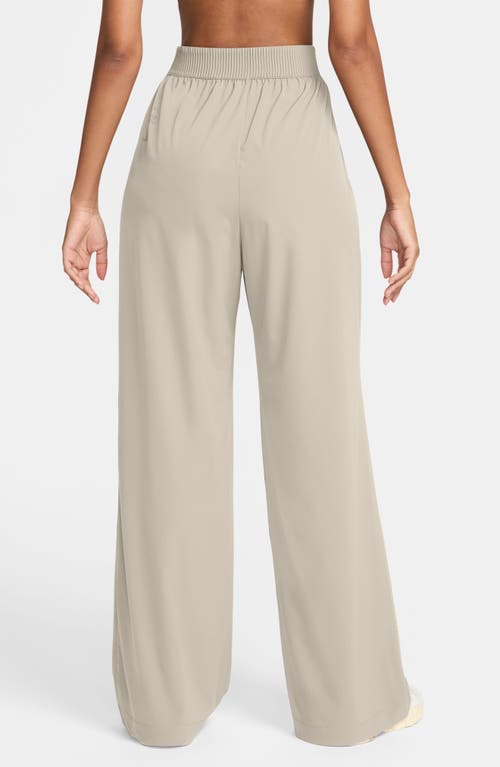 Nike 24.7 Perfectstretch Dri-fit High Waist Loose Wide Leg Pants In Light Orewood