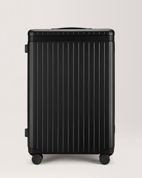 Carl Friedrik The Check-in Suitcase In Black/black