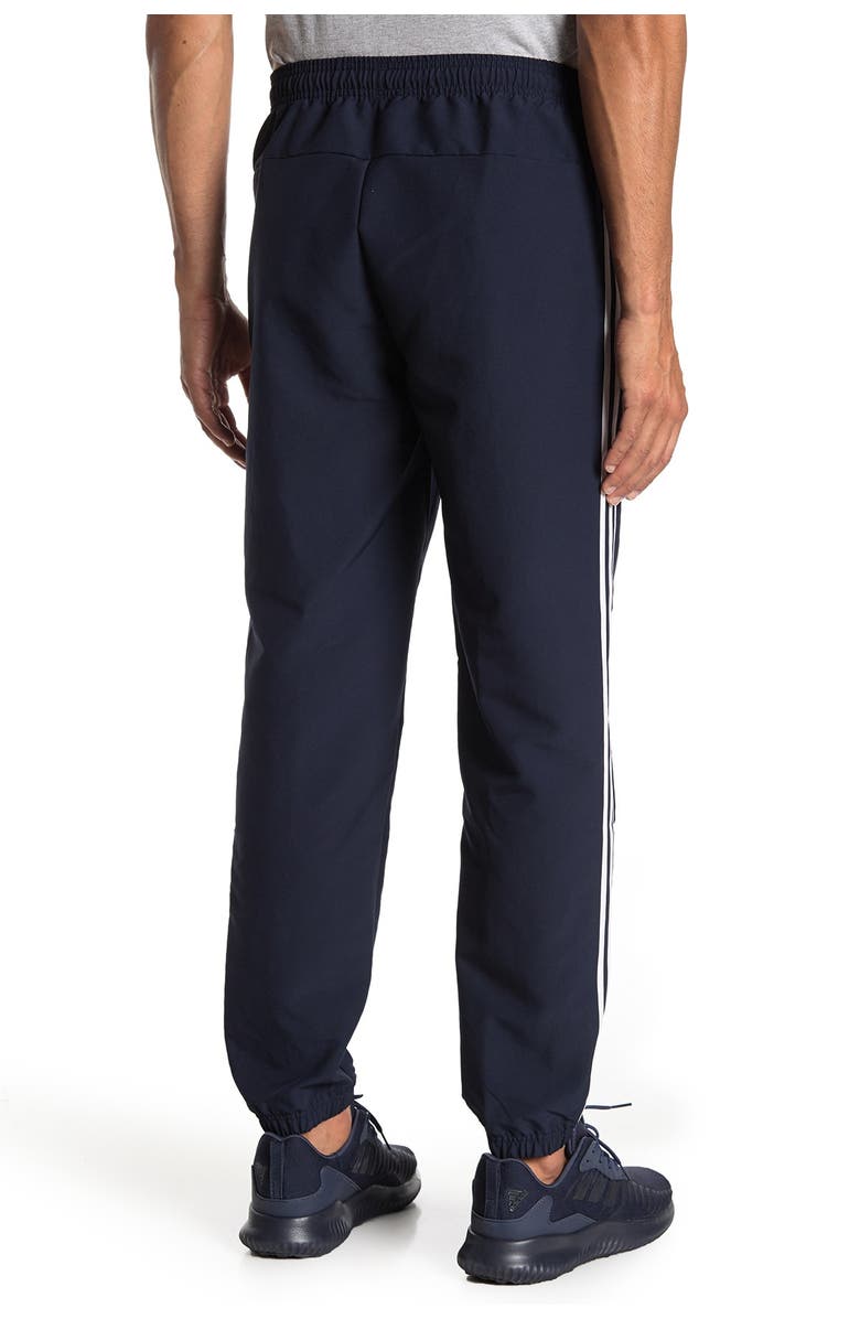 adidas Essentials 3 Stripes Wind Pants, Alternate, color, 