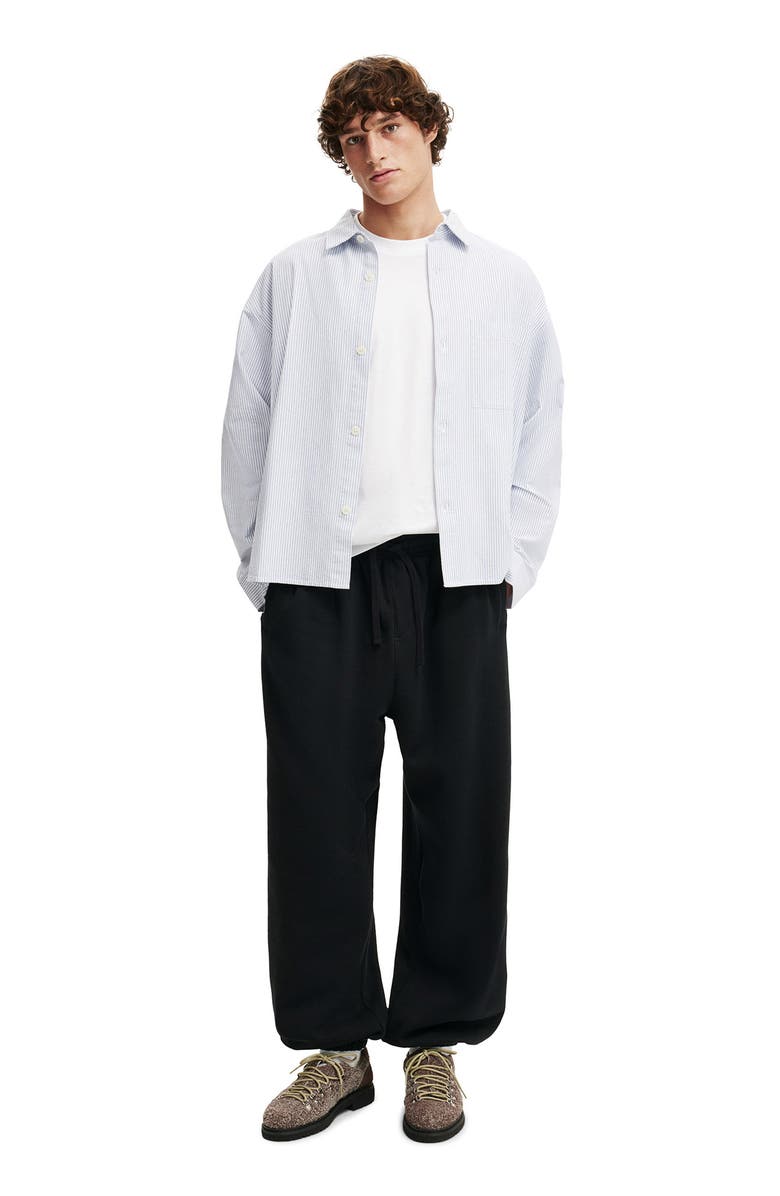 Cotton On Men's Super Baggy Cuffed Track Pant, Alternate, color, Black