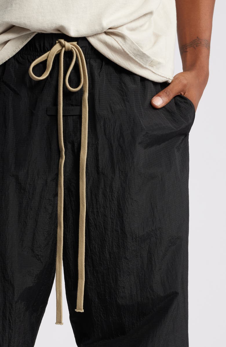 Fear of God Essentials Gender Inclusive Relaxed Fit Nylon Ripstop Pants, Alternate, color,